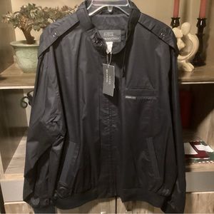 Men’s Members Only Jacket in medium size. Never worn with tags.